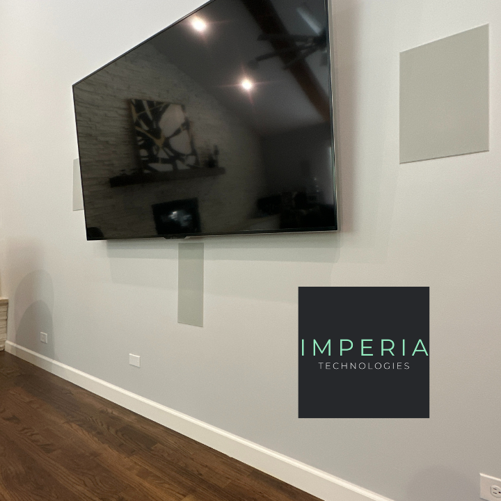 Wall-mounted flat-screen TV installation in a Naperville-area living room